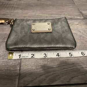 Michael Kors Gray silver metallic Monogram wristlet
